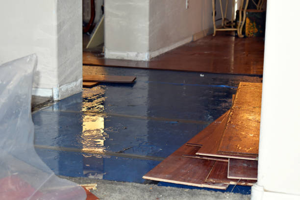 Professional Flood Damage Restoration technician working in Heath, MA